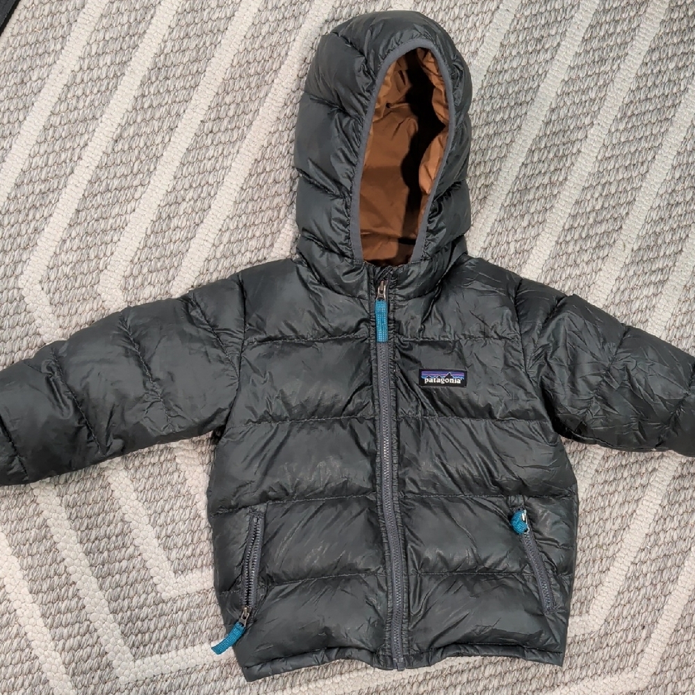 Patagonia Black Hooded Puffer Jacket with Blue Accents
